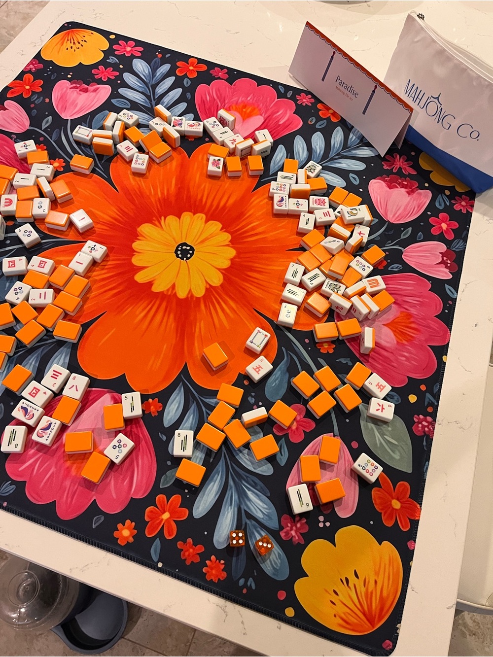 Mahjong Co. Paradise Tiles, Bag, Dice, & Matching Mat Set Orange Rainbow Floral